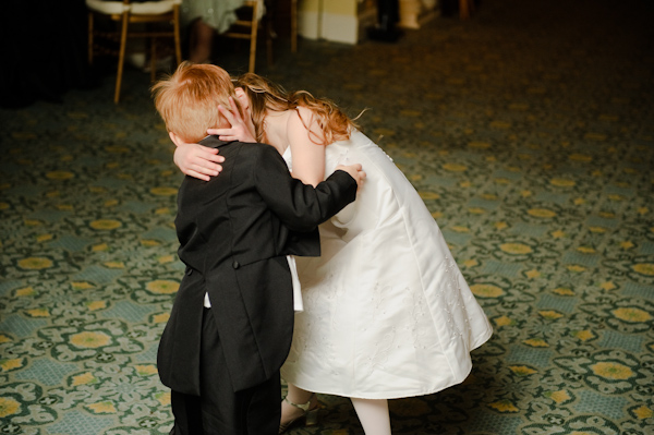 Young Flower Girl Giving The Ring Bearer A Kiss Photo By New York City Based Wedding 4296